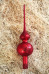 Ornament červený - červená špica